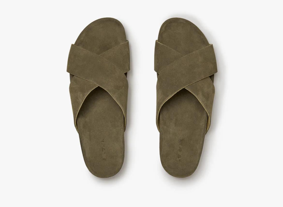 Green suede cross-over slip-on sandals top view